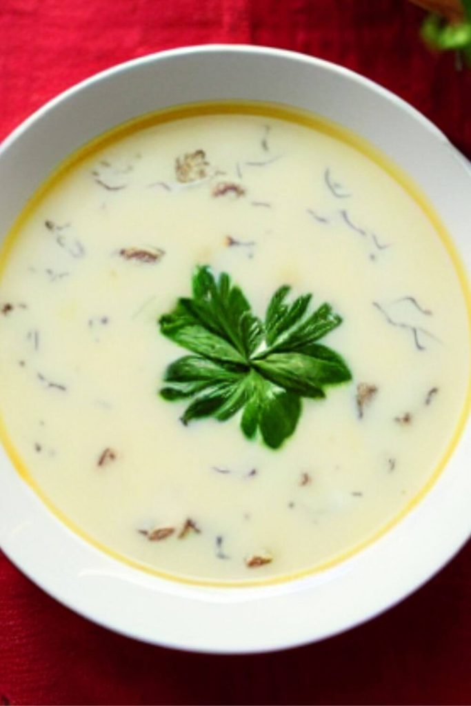 white bowl with creamy zuppa toscana soup